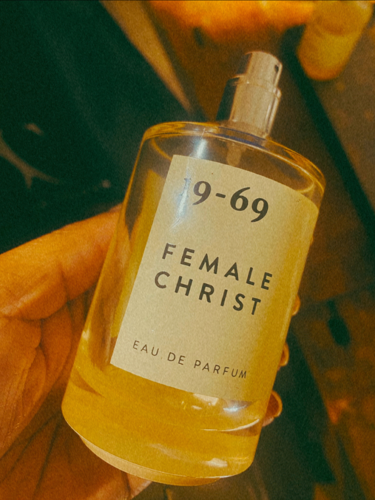 A bottle of 19-69 Female Christ Eau De Parfum